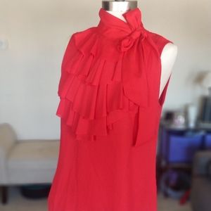 Red sleeveless blouse